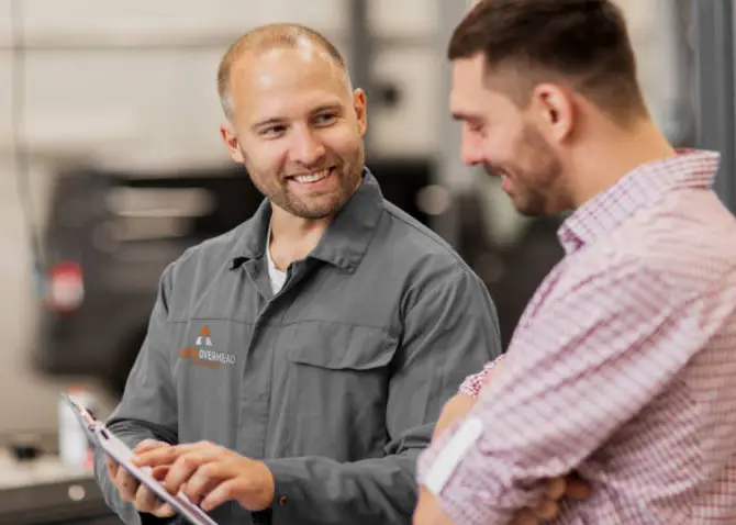 An Action Overhead garage door repair technician