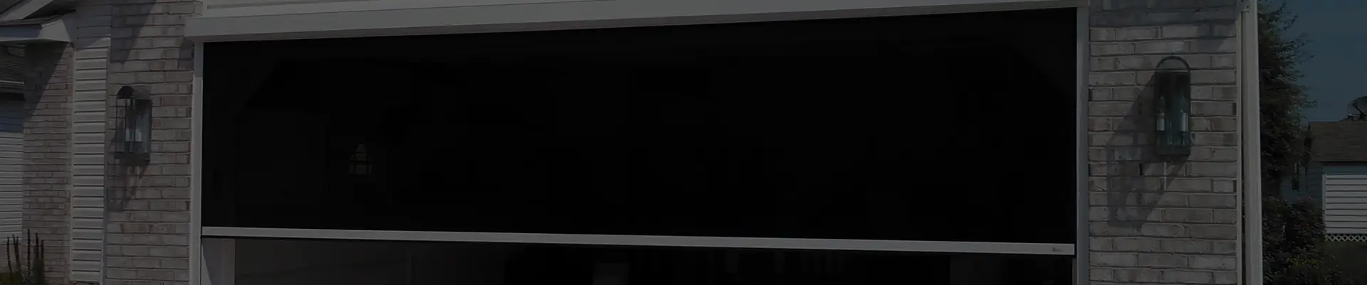 House with a half opened garage screen