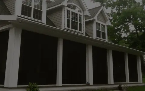 Residential garage door with Zip Tex Roll-up solar shades